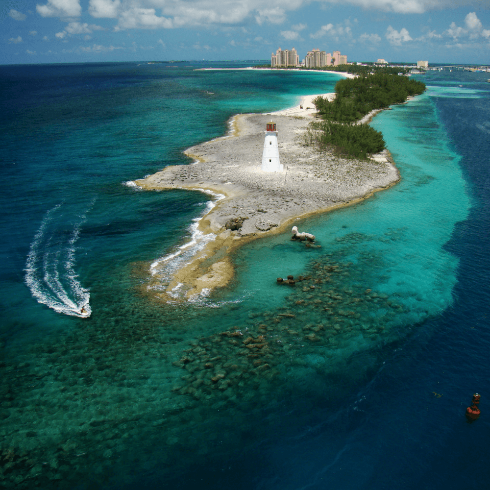 A small island with a light house on top of it