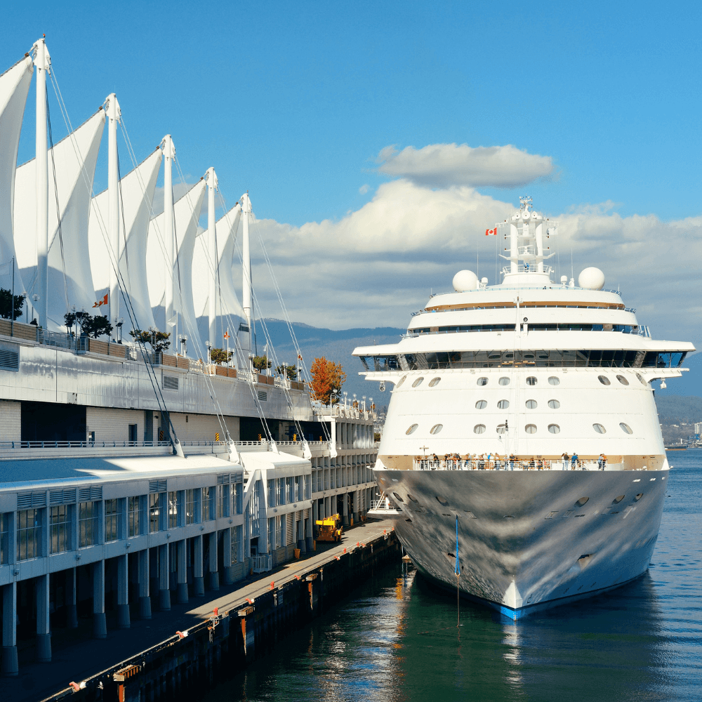 A large cruise ship docked at a dock