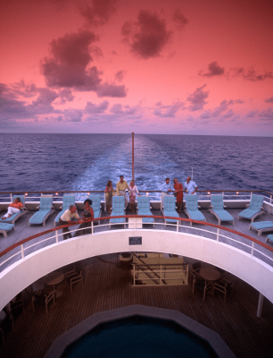 Group of people sitting on top of a boat